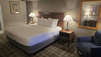 Desk, laptop workspace, blackout drapes, iron/ironing board