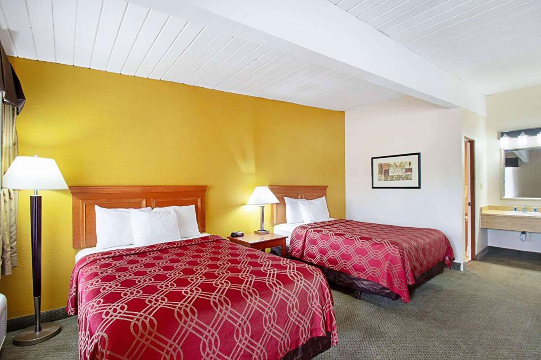 Desk, blackout drapes, iron/ironing board, rollaway beds