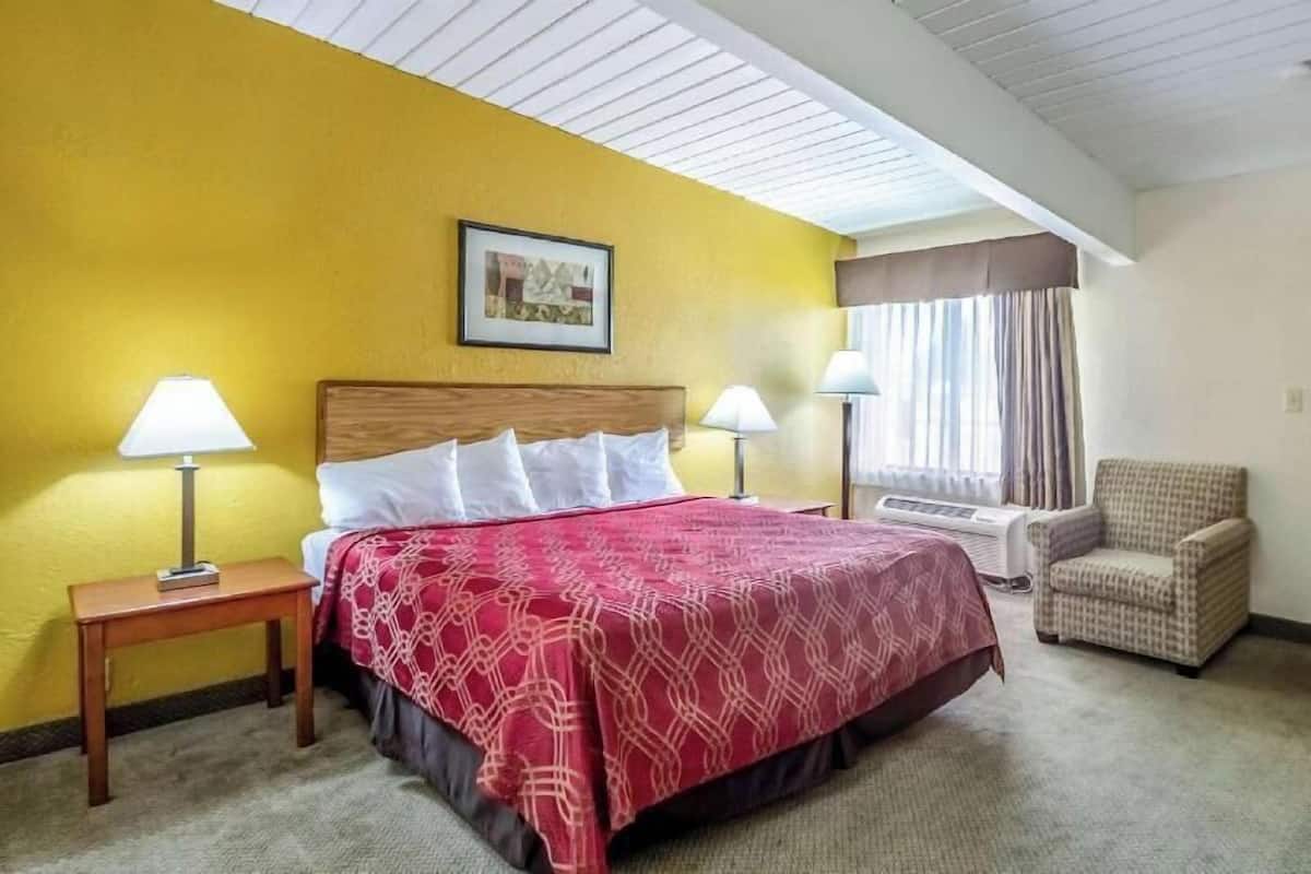 Desk, blackout drapes, iron/ironing board, rollaway beds