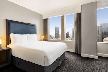 Premium bedding, pillowtop beds, in-room safe, desk at Hilton Motif Seattle