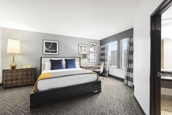 Penthouse Suite, 1 King Bed with Fireplace (Water View) | Premium bedding, pillowtop beds, in-room safe, desk at Hilton Motif Seattle