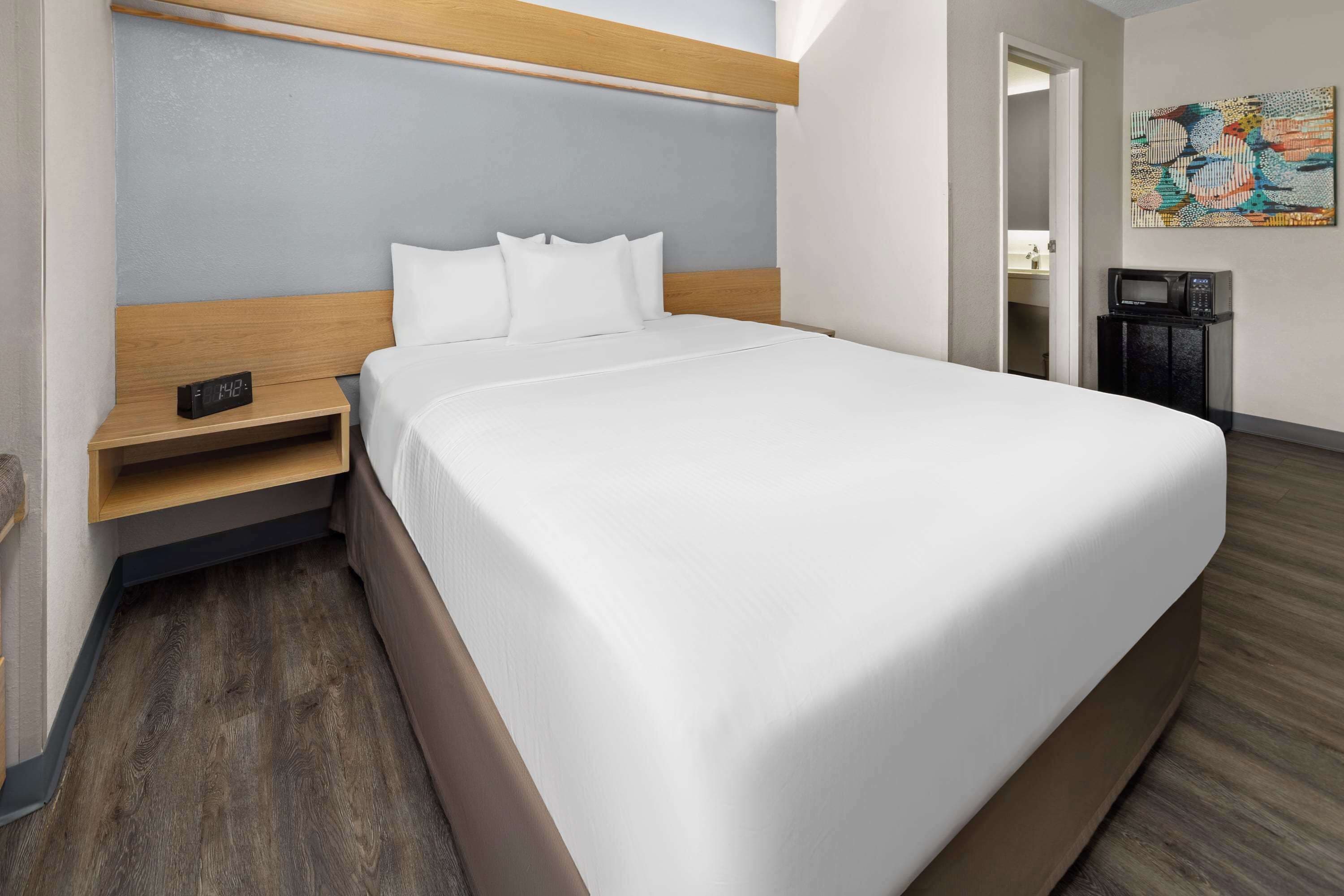 in-room safe, desk, blackout curtains, iron/ironing board