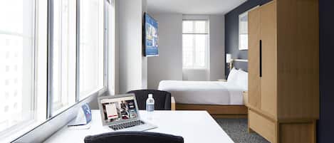 Suite, cuisinette | 1 chambre, literie de qualité, coffre-fort, bureau