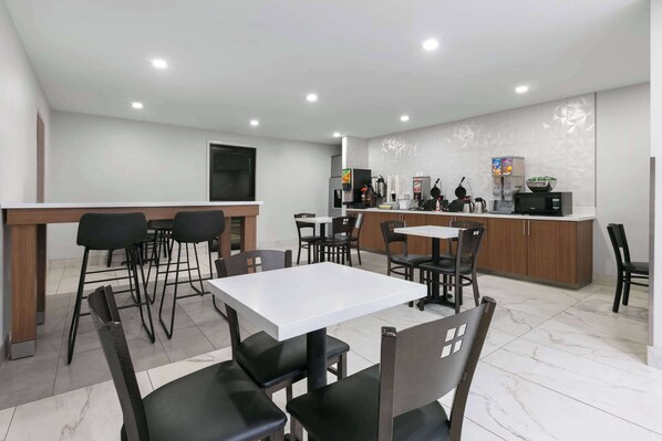 Free daily continental breakfast - Super 8 by Wyndham Grapevine/DFW Airport Northwest (Grapevine)