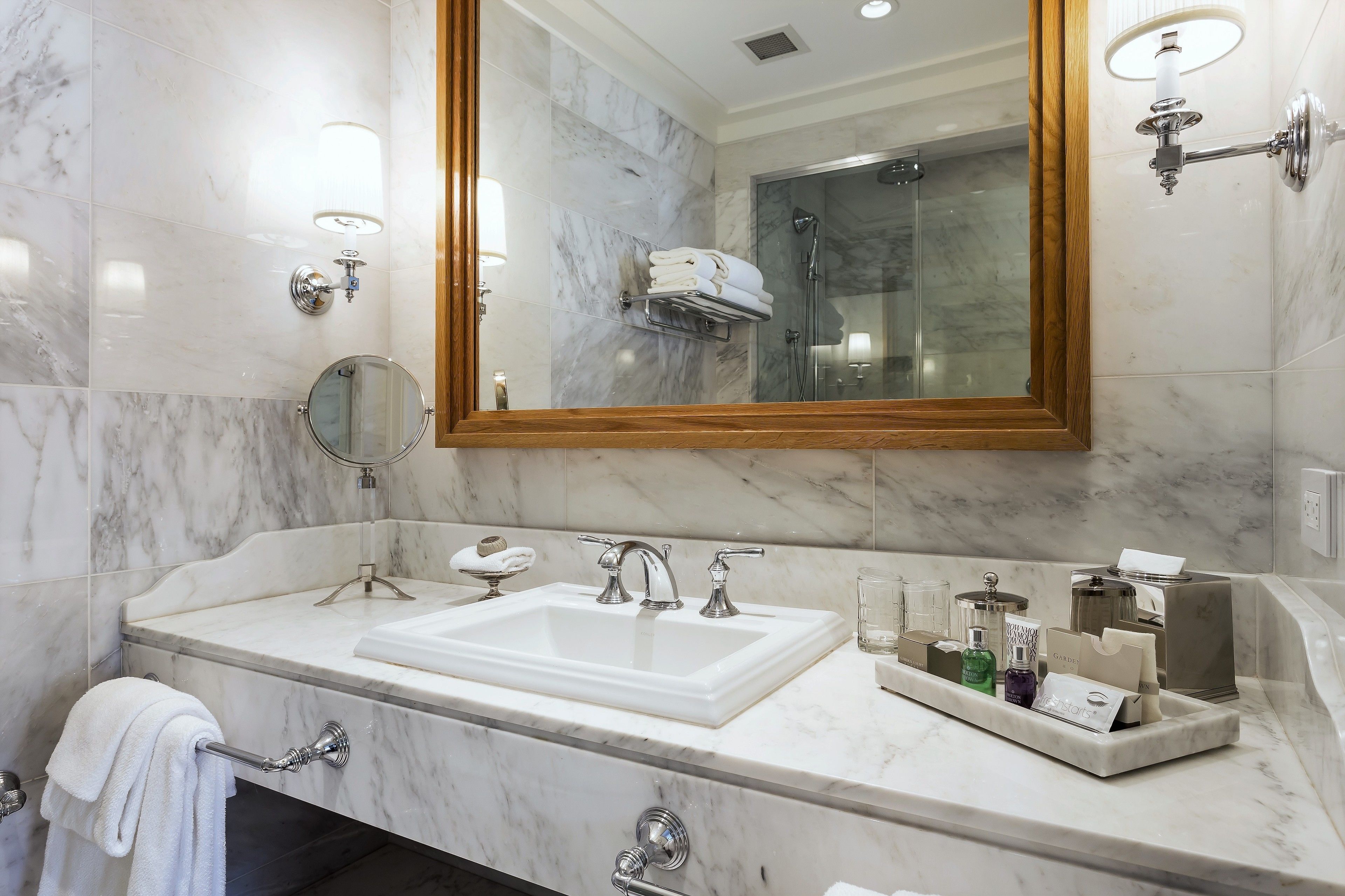 deluxe room, 1 king bed, fireplace | bathroom | shower, designer toiletries, hair dryer, bathrobes