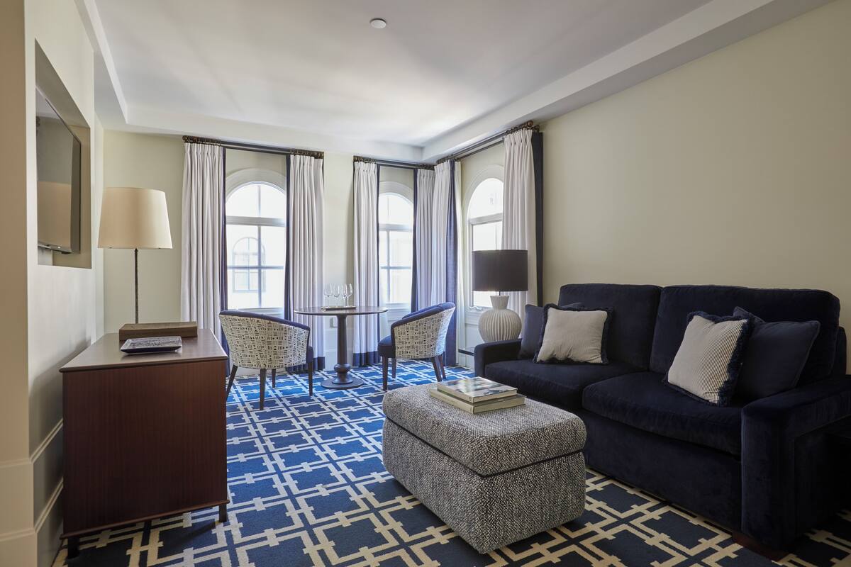 Deluxe Suite, 1 King Bed | Living area | 49-inch flat-screen TV with digital channels, TV