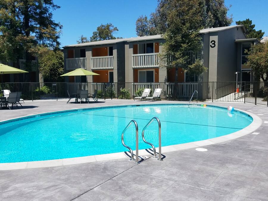 Outdoor pool, open 7:00 AM to 9:00 PM, pool umbrellas, pool loungers