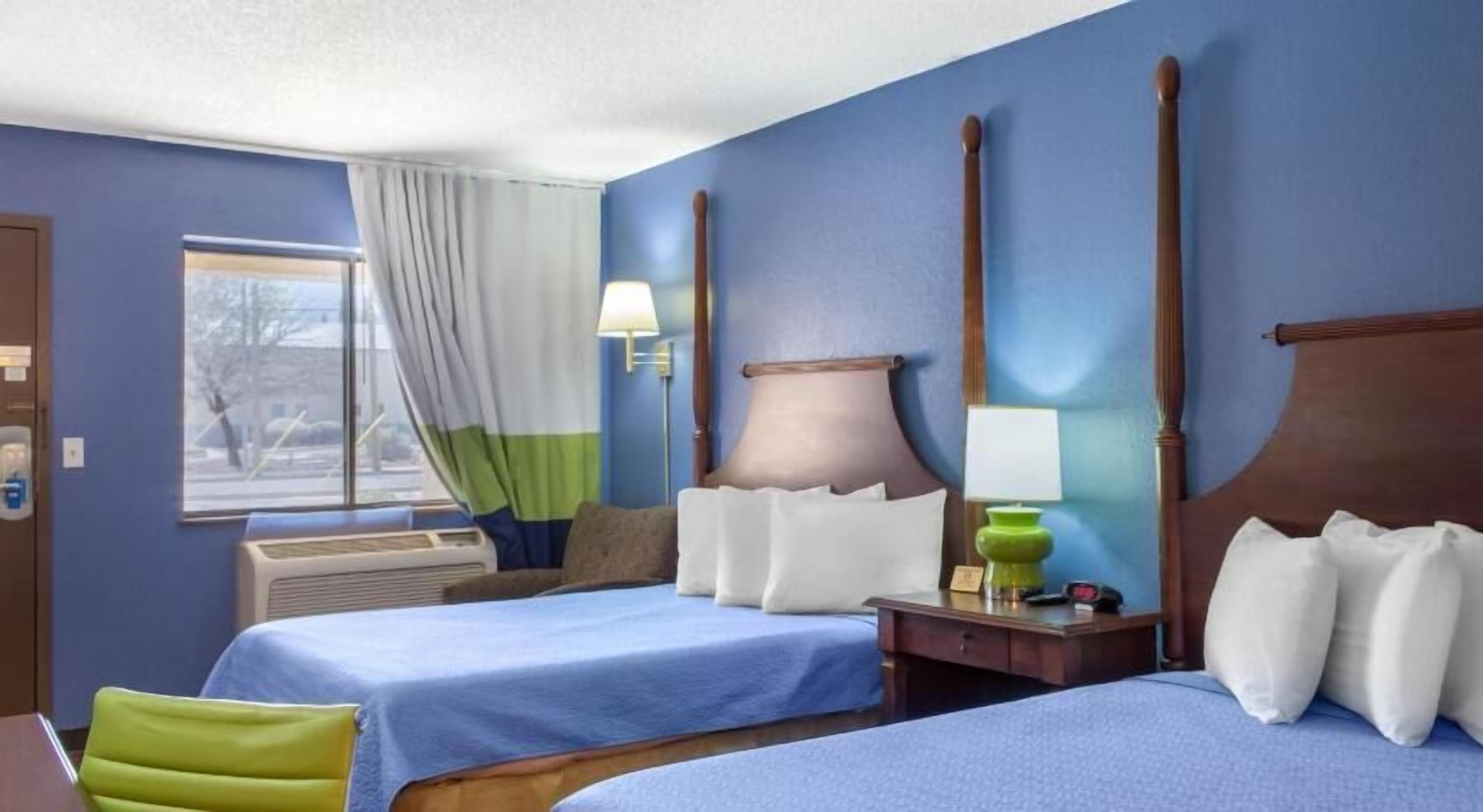 Desk, iron/ironing board, free cribs/infant beds, rollaway beds