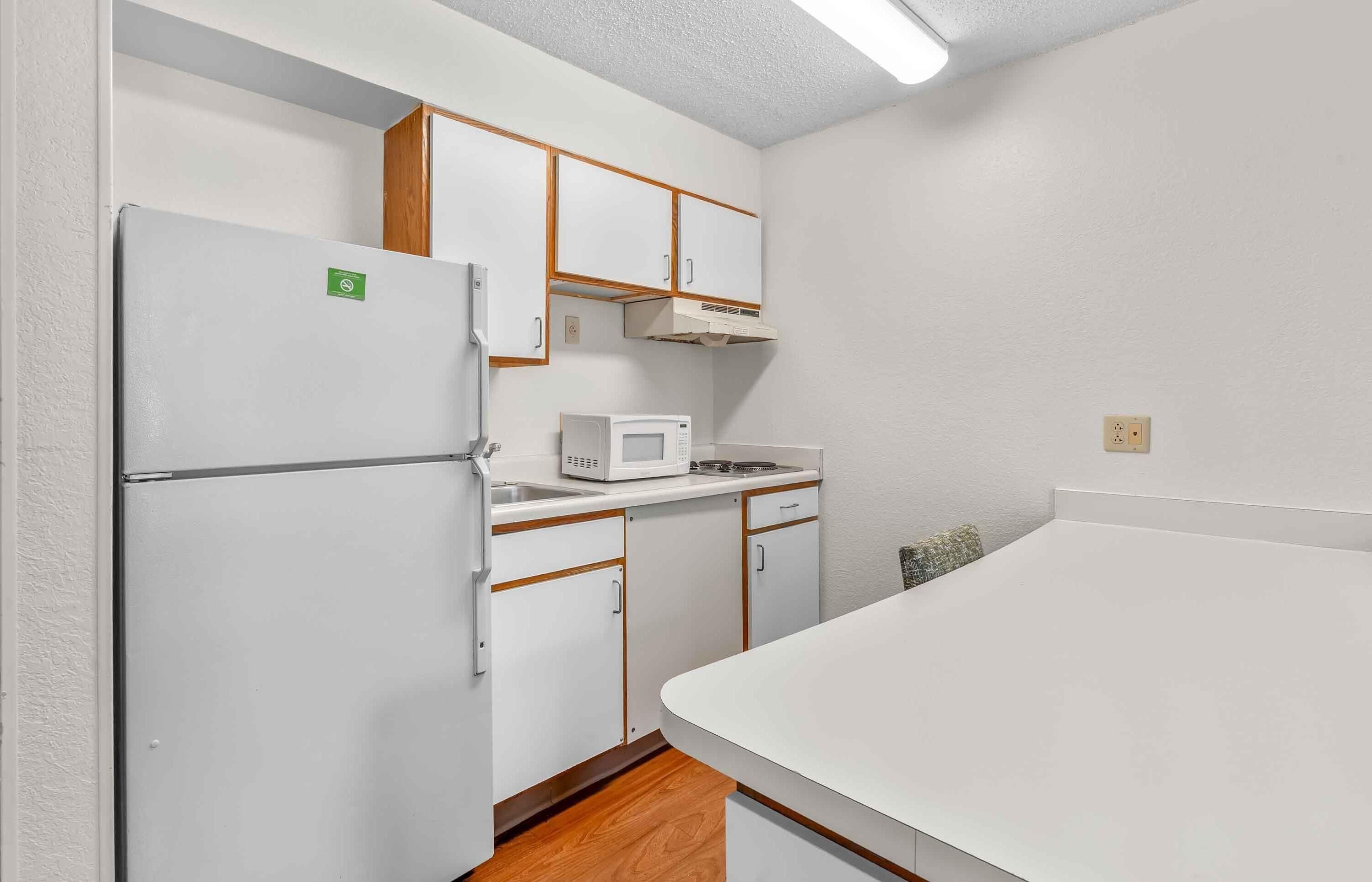 Studio, 2 Queen Beds, Non Smoking | Private kitchen | Coffee/tea maker, fridge, microwave, stovetop