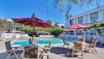 Outdoor pool, open 9:00 AM to 9:00 PM, pool umbrellas, sun loungers