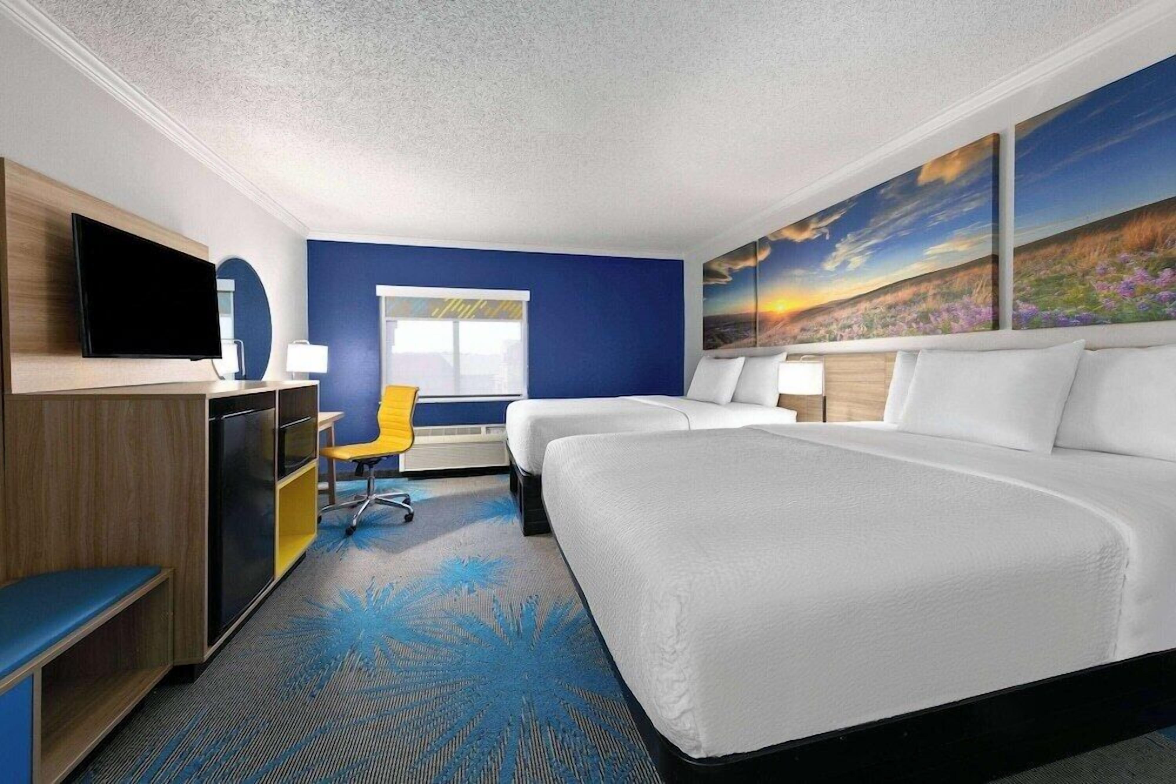 Down duvets, pillow-top beds, desk, laptop workspace