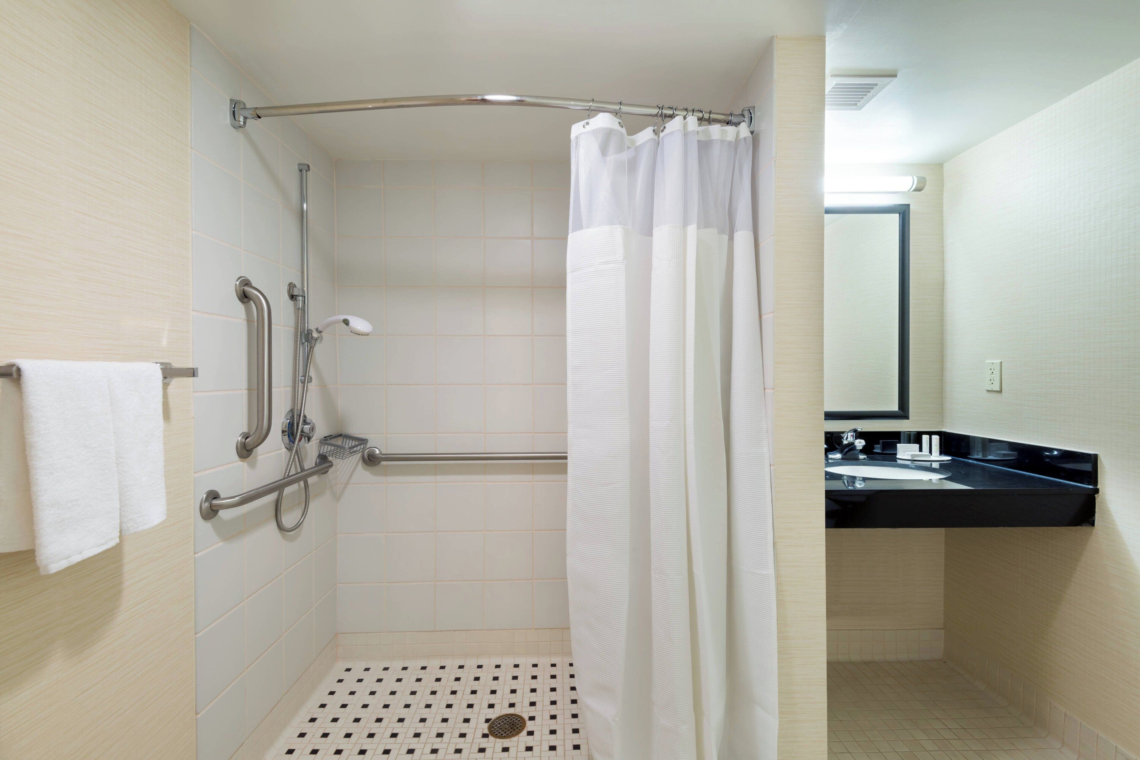 combined shower/bathtub, free toiletries, hair dryer, towels