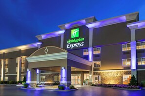 A Holiday Inn Express hotel with a modern facade, large entrance, and well-lit exterior. - Holiday Inn Express Bowling Green by IHG (Bowling Green)