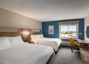 Premium bedding, pillowtop beds, desk, laptop workspace