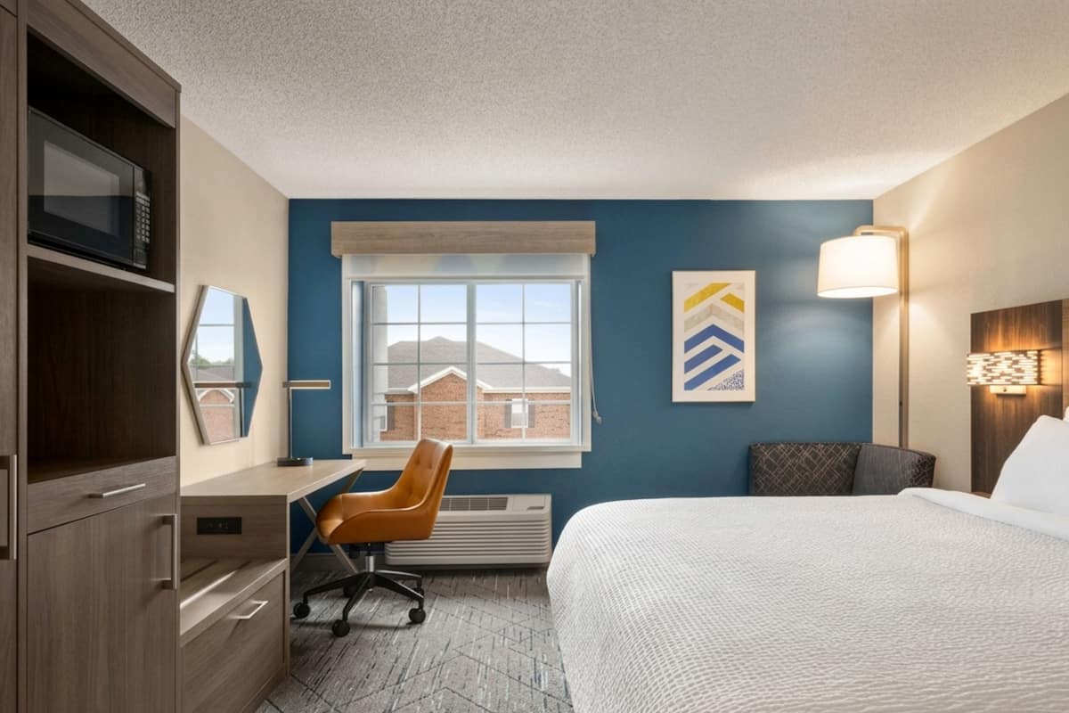 Premium bedding, pillowtop beds, desk, laptop workspace