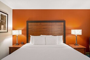 Premium bedding, pillow-top beds, desk, laptop workspace