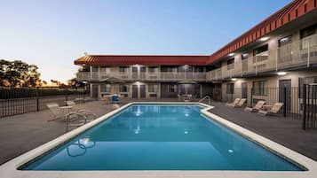 Outdoor pool, open 10 AM to 10 PM, pool umbrellas, sun loungers