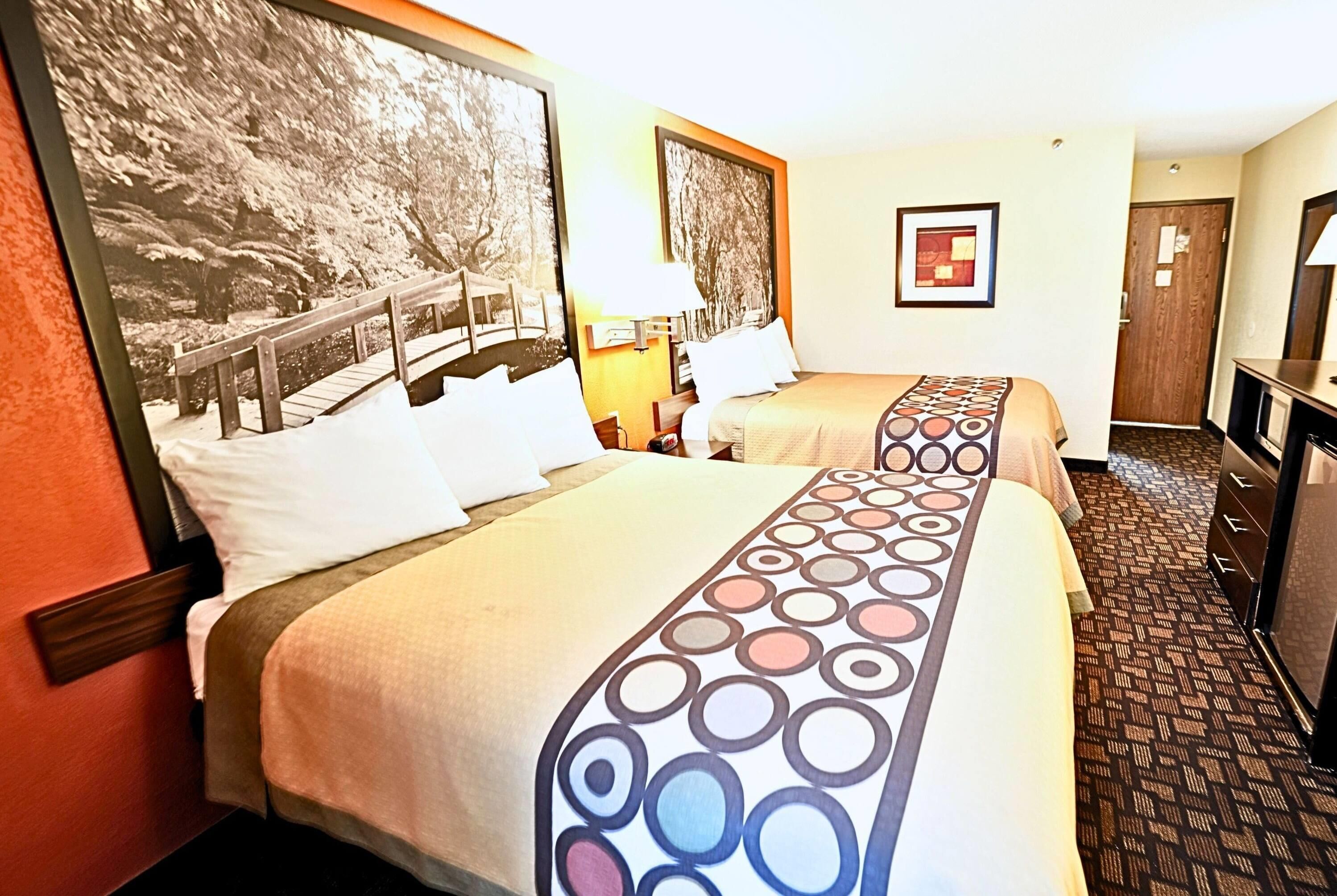 Standard Room, 2 Queen Beds | Desk, iron/ironing board, free cribs/infant beds, free WiFi