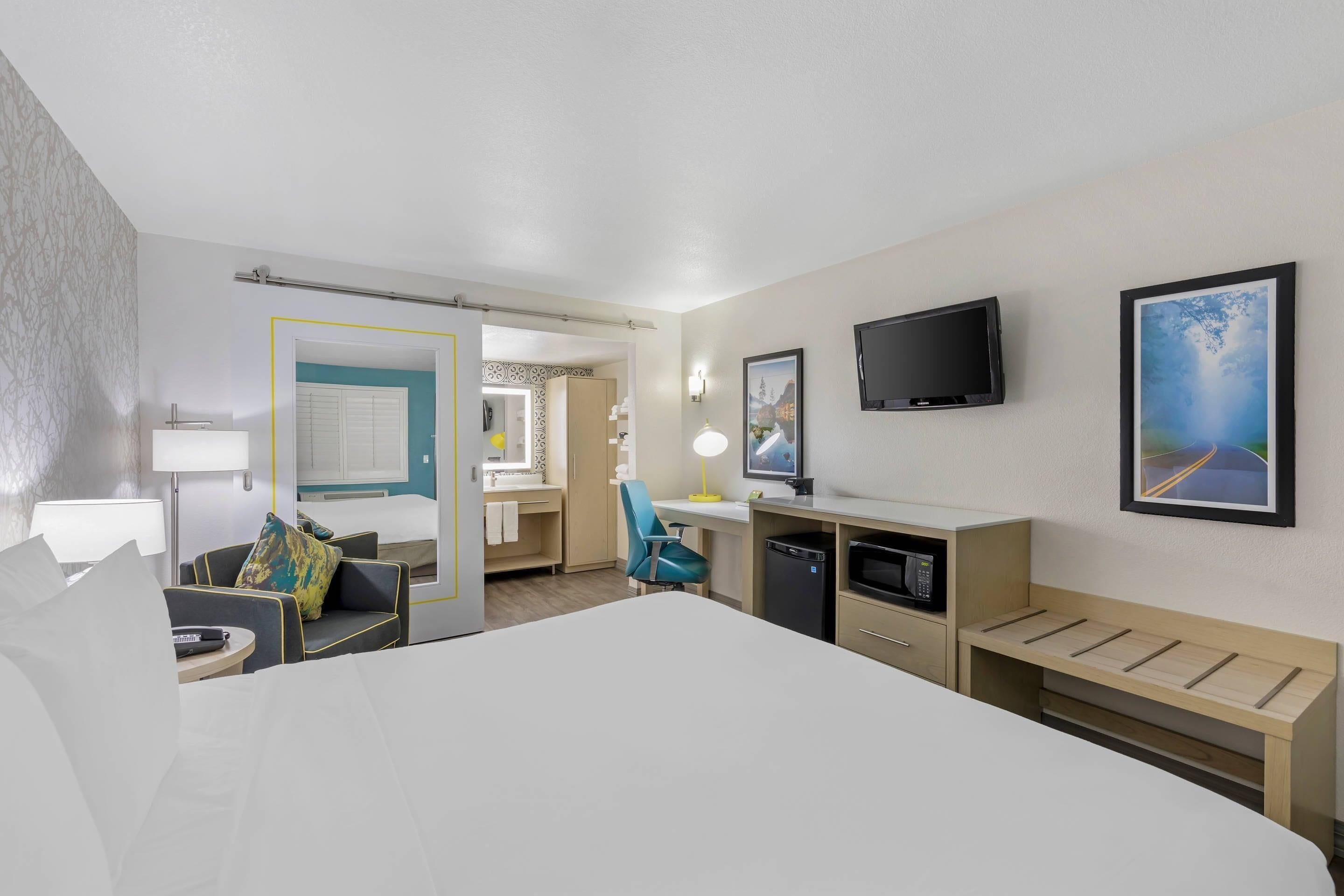 Desk, laptop workspace, blackout curtains, free WiFi