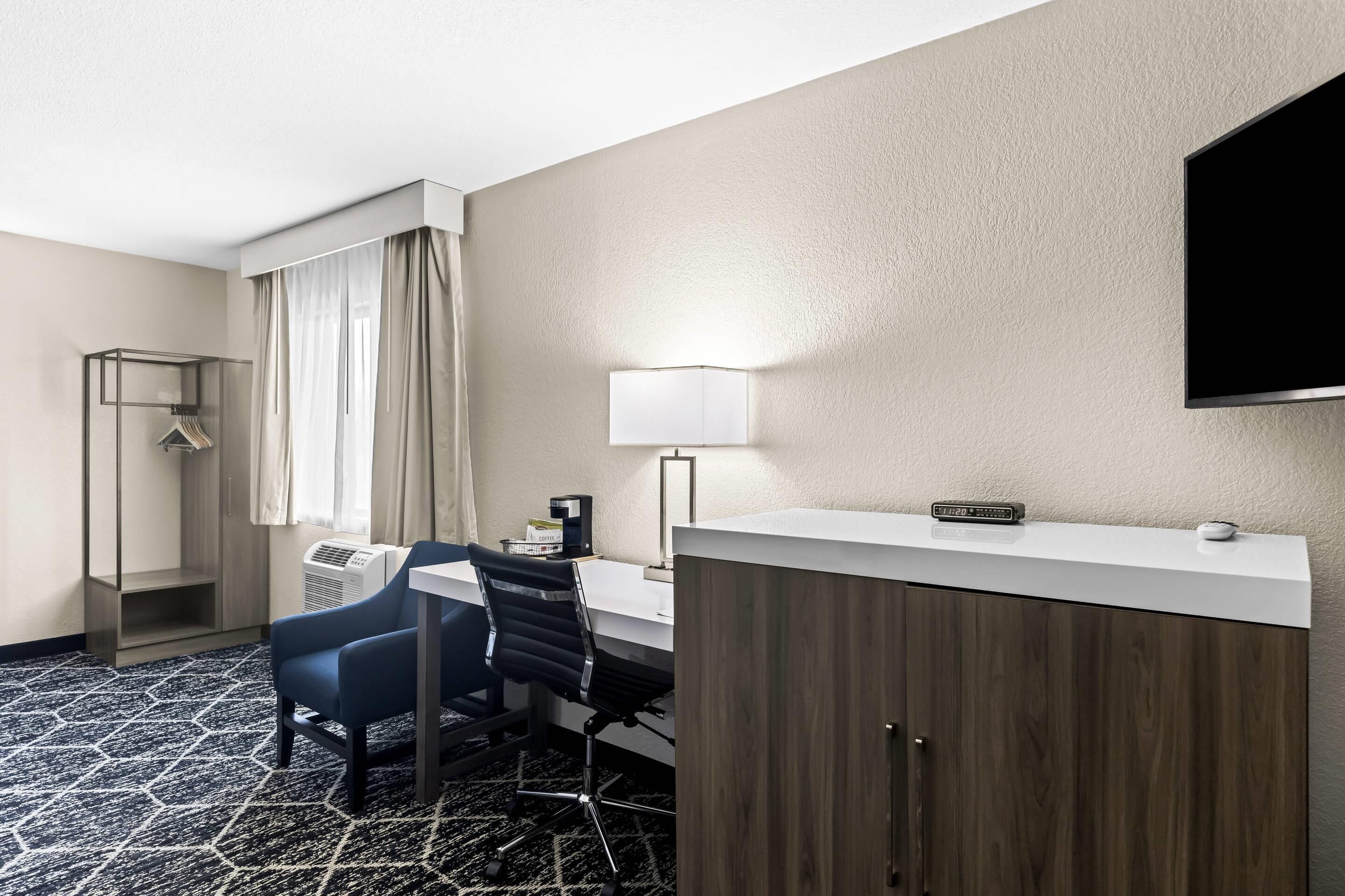 Standard Room, Multiple Beds, Non Smoking | Desk, laptop workspace, blackout curtains, iron/ironing board