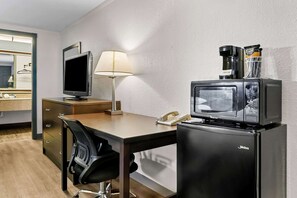 Desk, laptop workspace, free WiFi, bed sheets