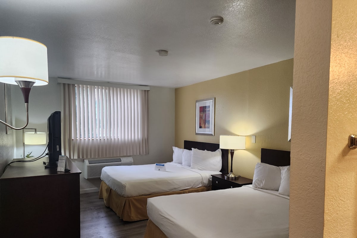 Standard Room, 2 Queen Beds, Non Smoking | Desk, iron/ironing board, bed sheets, alarm clocks