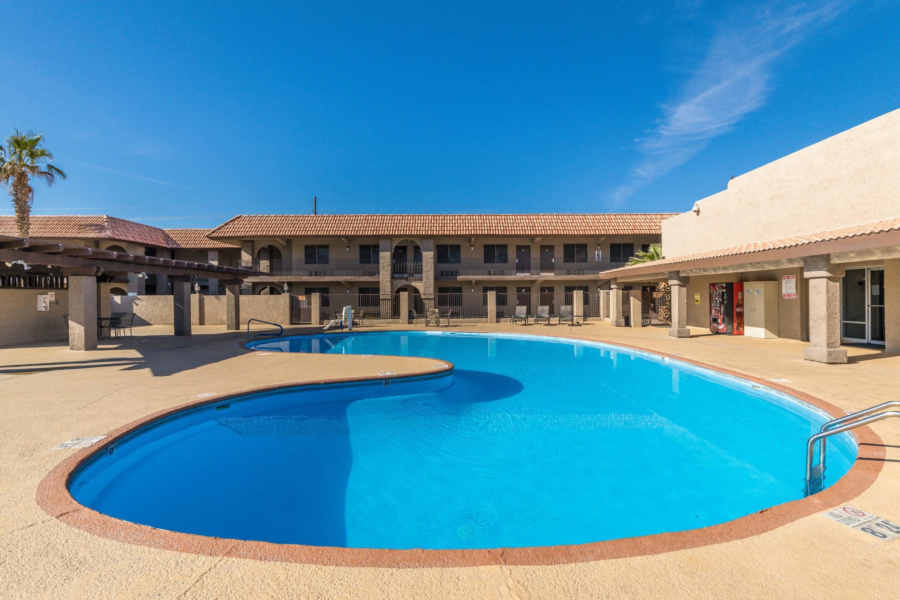 Outdoor pool, open 7:00 AM to 11:00 PM, sun loungers