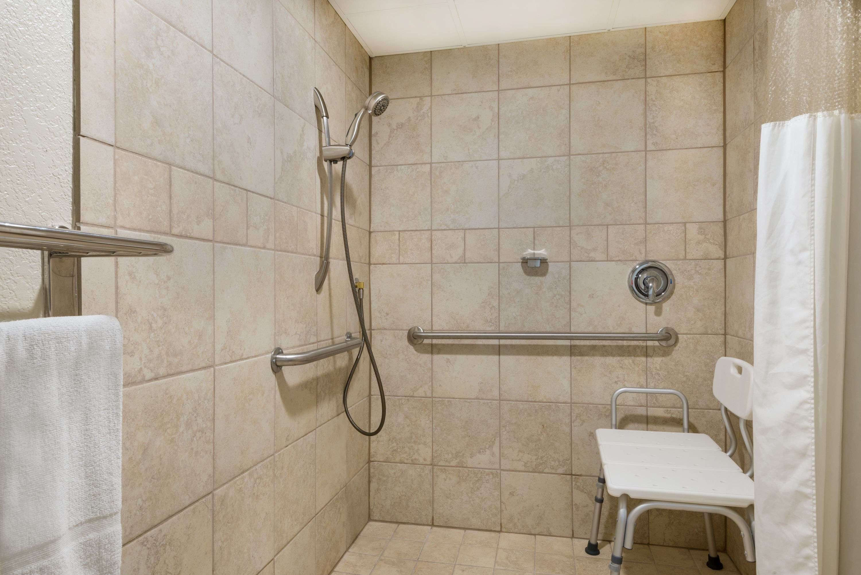 combined shower/bathtub, free toiletries, hair dryer, towels