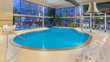 Indoor pool, outdoor pool, open 9:00 AM to 9:00 PM, pool loungers