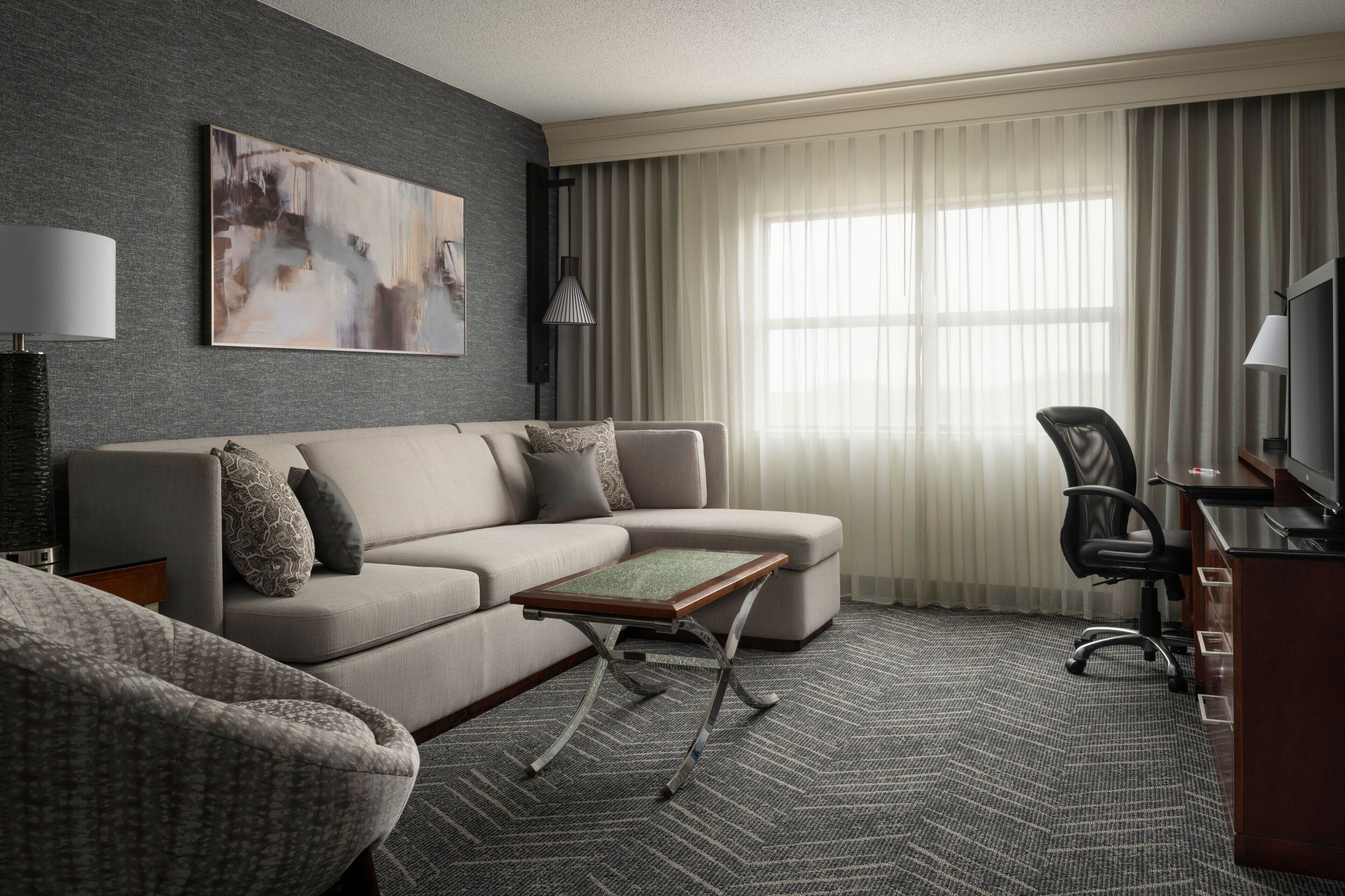 executive suite, 1 bedroom, non smoking | living area | 55-inch lcd tv with cable channels, tv