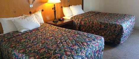 Desk, laptop workspace, blackout drapes, iron/ironing board