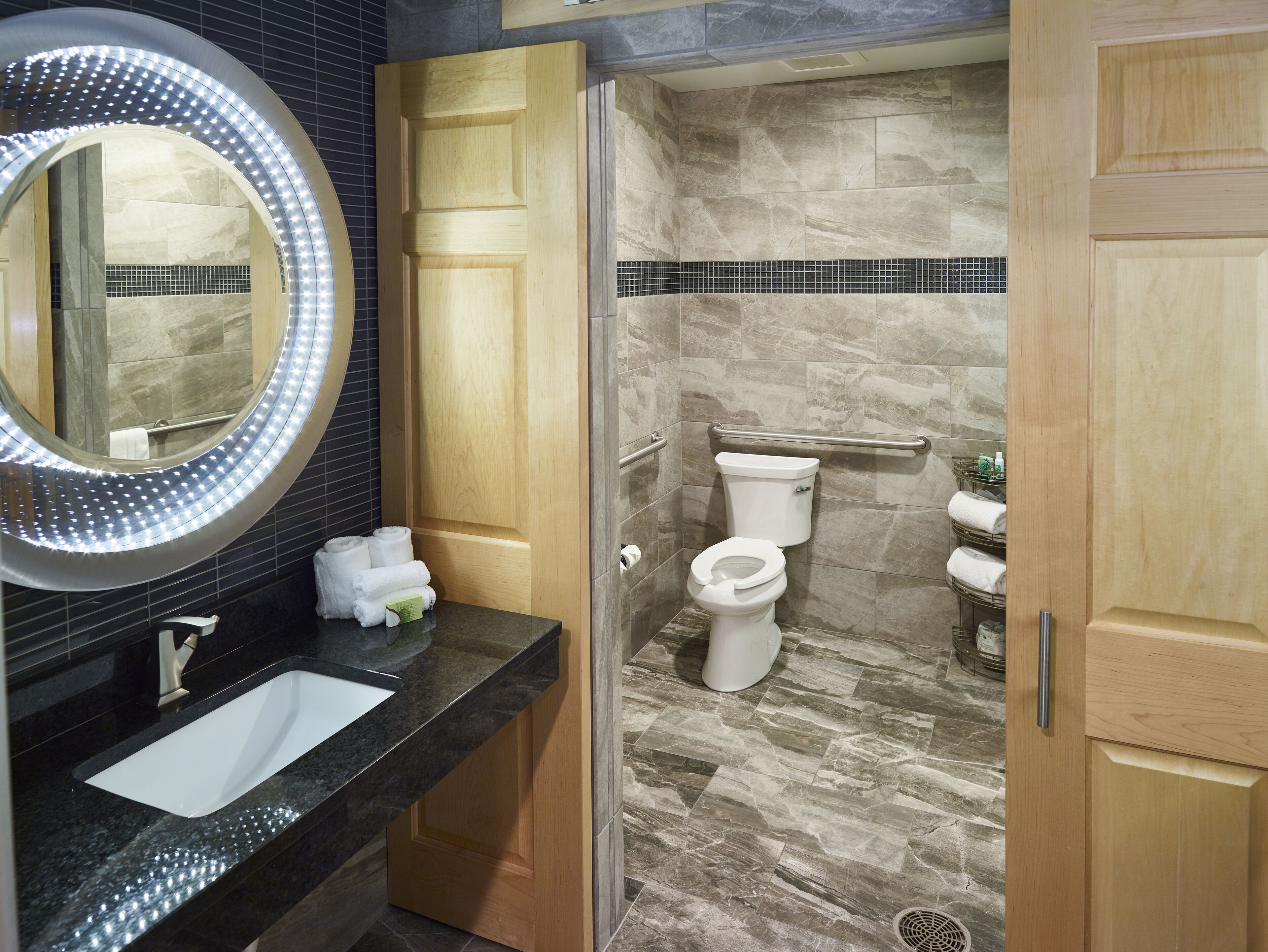 signature suite | bathroom | combined shower/bathtub, free toiletries, hair dryer, towels