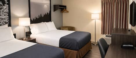 Escritorio, cortinas blackout, cunas gratuitas y camas extra