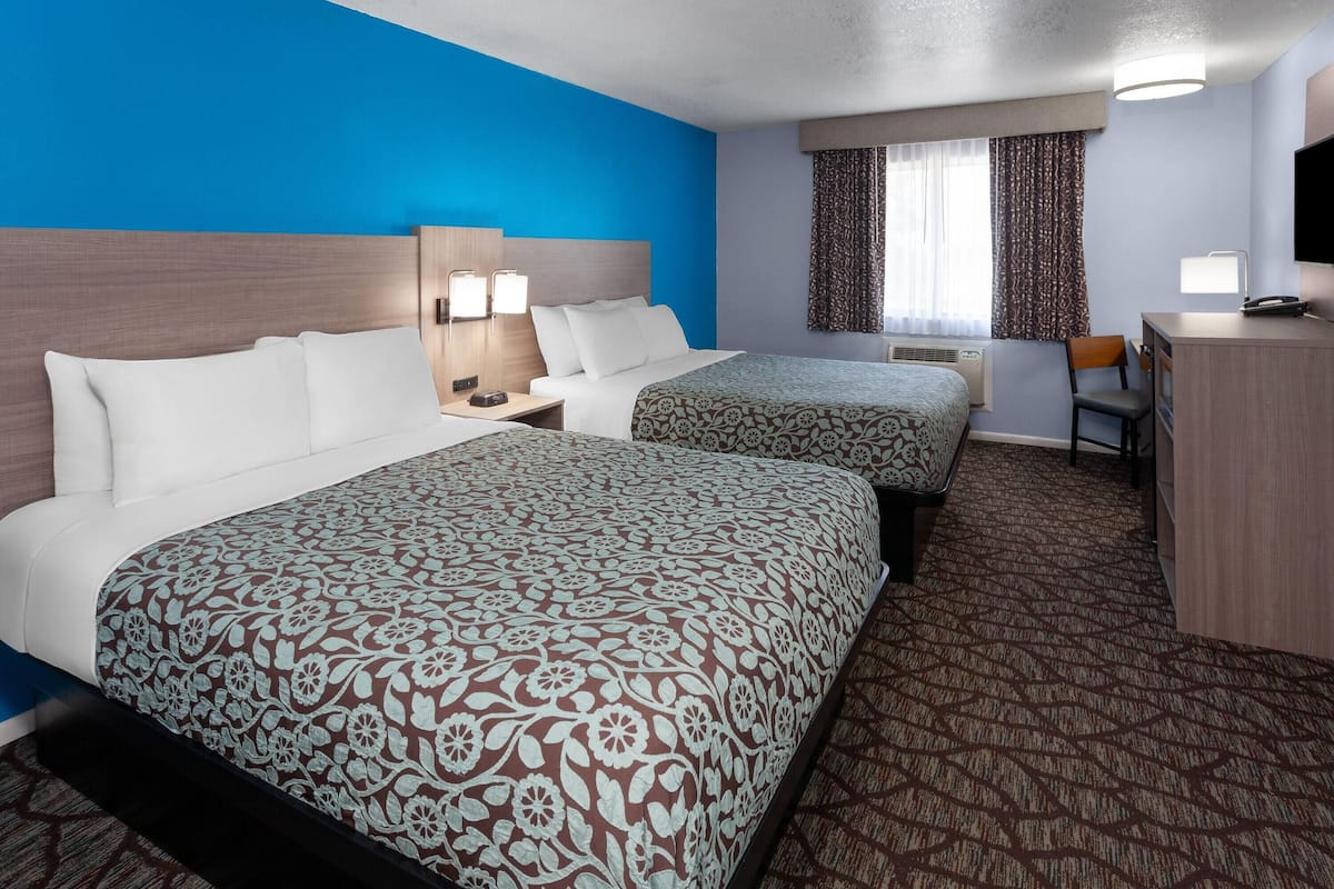 Suite, 2 Queen Beds, Non Smoking | Desk, laptop workspace, blackout drapes, soundproofing
