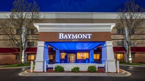A hotel entrance with a prominent "Baymont 2873" sign.