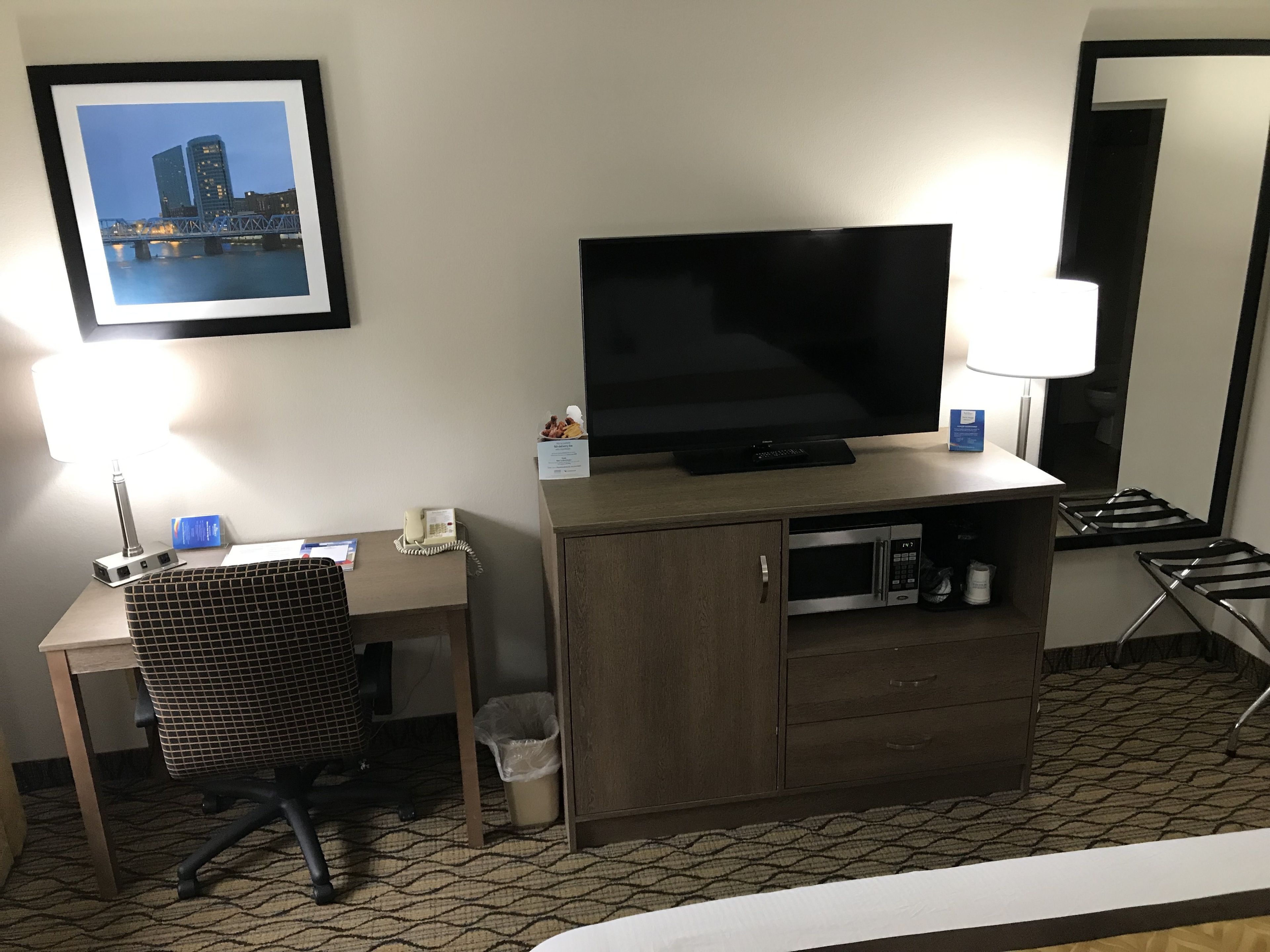 desk, laptop workspace, blackout curtains, iron/ironing board