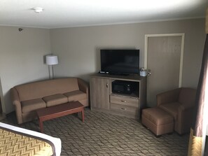 Deluxe Studio Suite, 1 King Bed with Sofa bed | Living area | TV