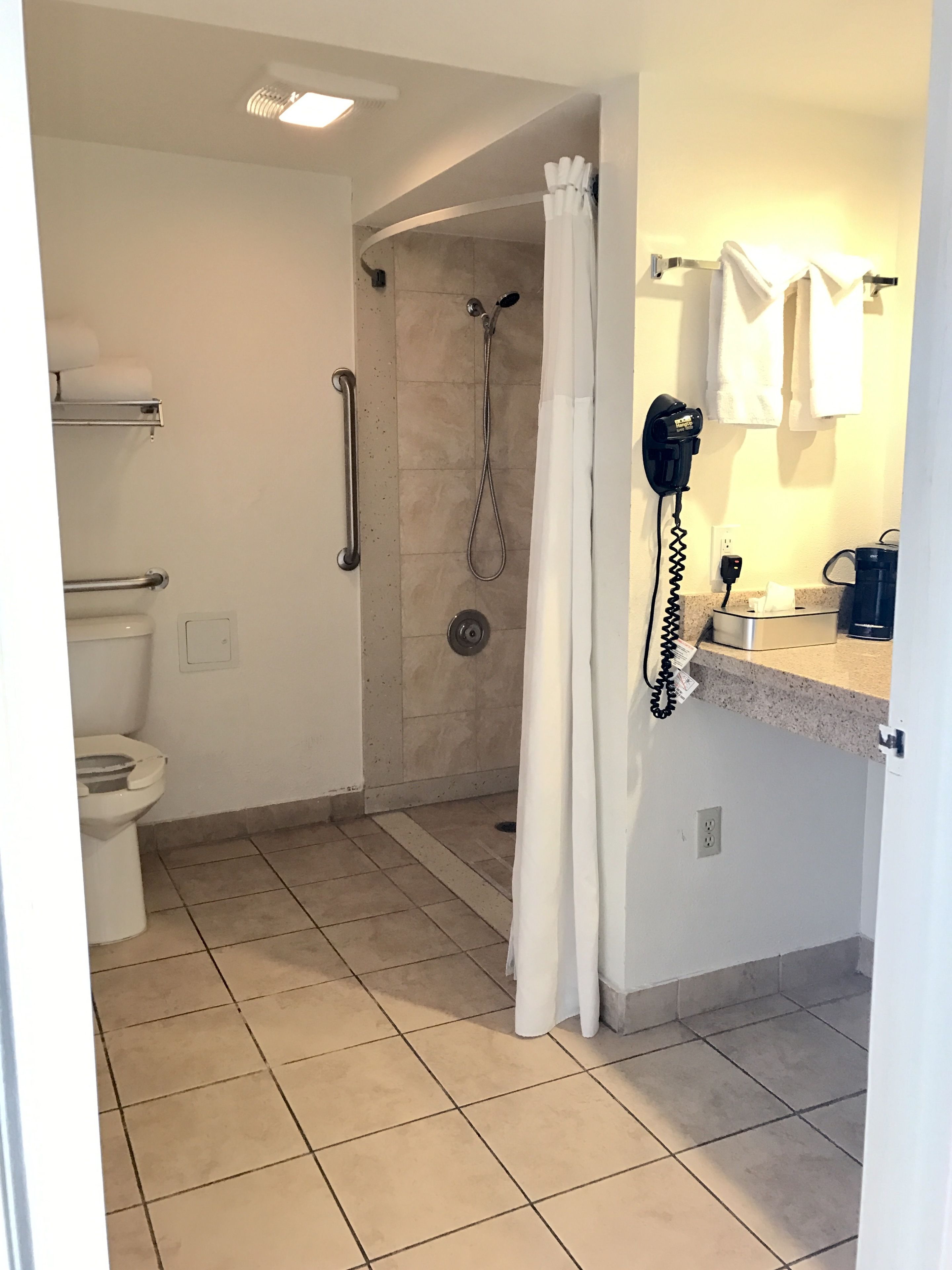 Room, 2 Double Beds, Accessible, Non Smoking (Mobility) | Bathroom | Combined shower/tub, free toiletries, hair dryer, towels