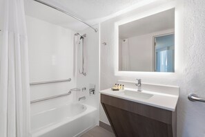 Combined shower/bathtub, deep-soaking bathtub, designer toiletries