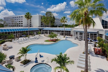 2 outdoor pools, open 8:00 AM to 11:00 PM, pool umbrellas, sun loungers at Wyndham Orlando Resort & Conference Center, Celebration Area