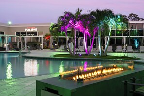 2 outdoor pools, open 8:00 AM to 11:00 PM, pool umbrellas, pool loungers