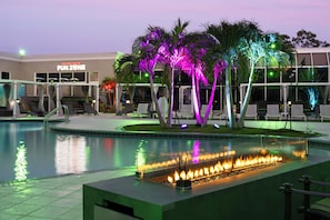 2 outdoor pools, open 8:00 AM to 11:00 PM, pool umbrellas, pool loungers