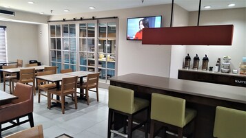 Free daily self-serve breakfast