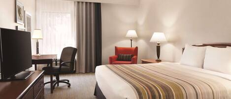 Premium bedding, blackout drapes, iron/ironing board