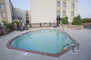 Seasonal outdoor pool, pool loungers