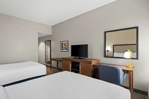 Standard room with two queen beds | Premium bedding, in-room safe, desk, laptop workspace