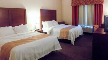 Desk, blackout drapes, iron/ironing board, free cribs/infant beds