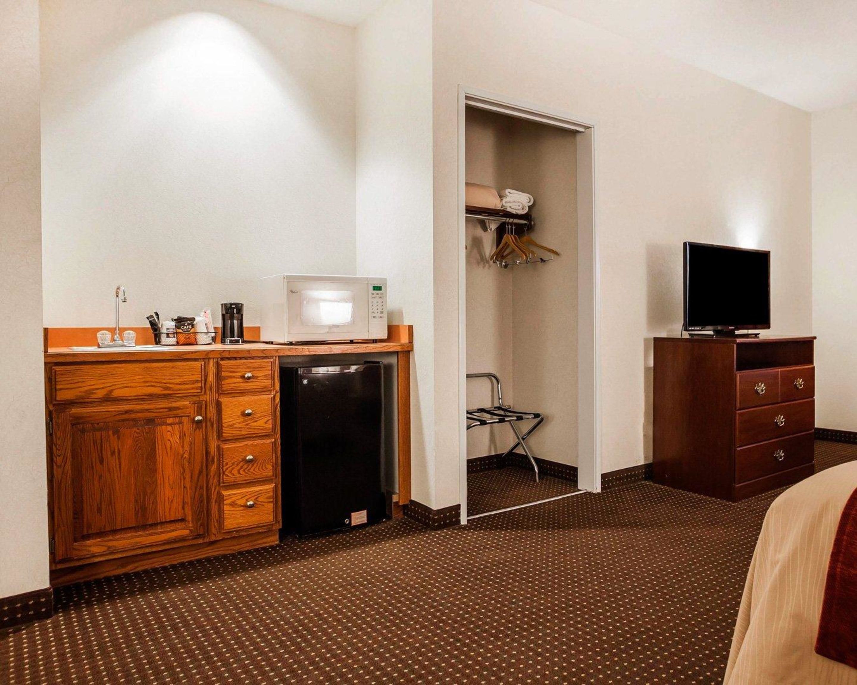 Desk, blackout drapes, iron/ironing board, free cribs/infant beds