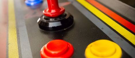 A control panel with buttons in red, yellow, and blue.