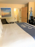 Desk, laptop workspace, iron/ironing board, free cribs/infant beds